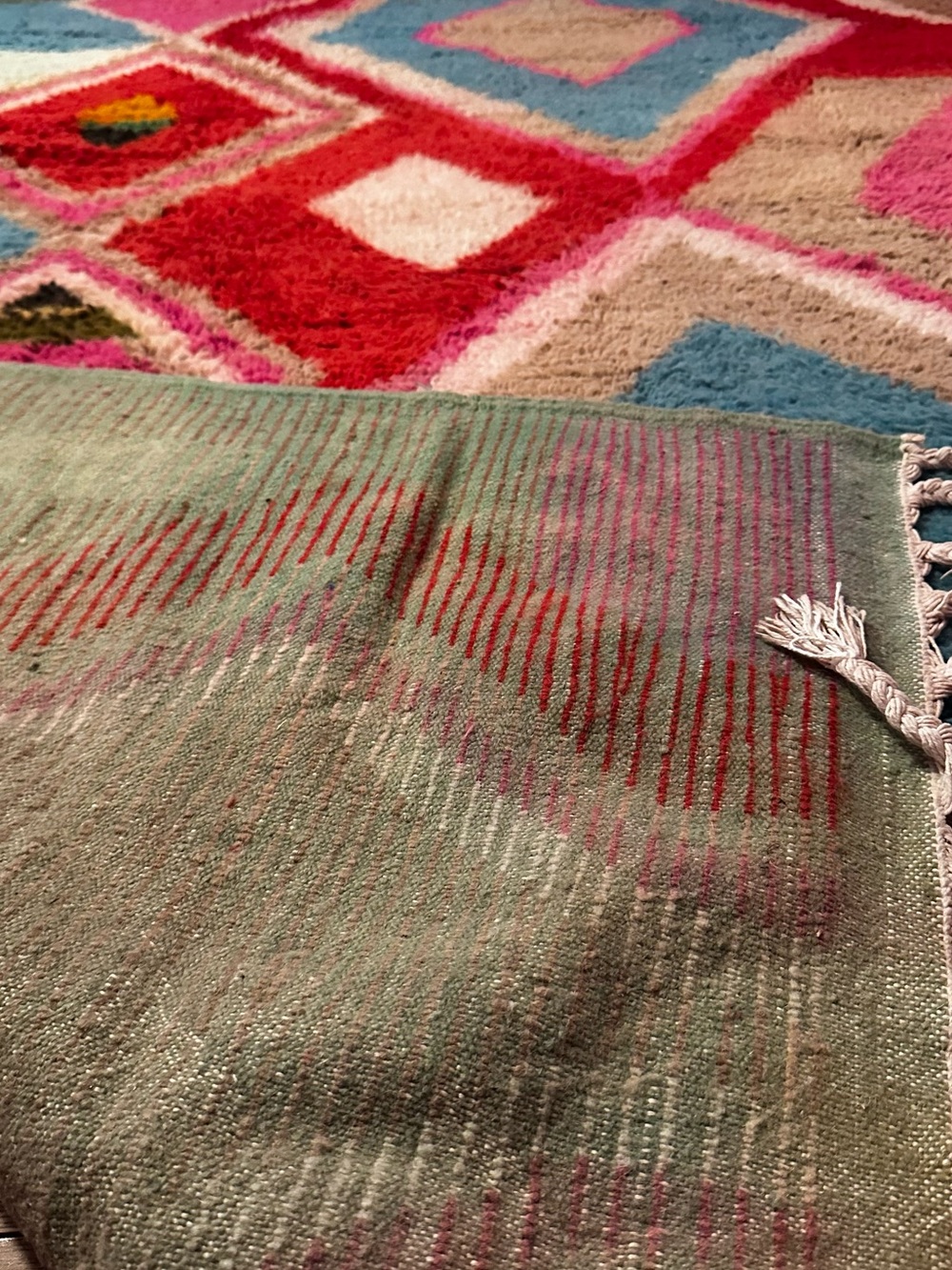 Green Woven Textile Rug with Red Stripe Accents